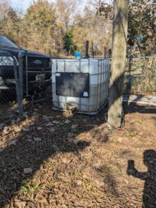 Water storage tank near a hydropanel in Texas.