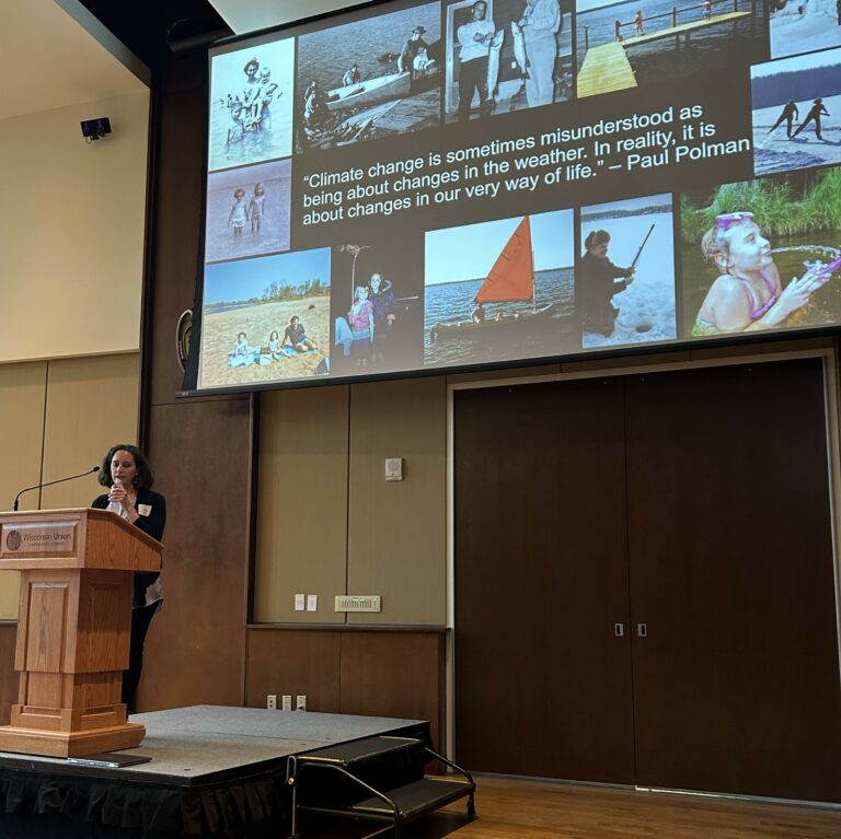 Katie Hein giving the Symposium Keynote